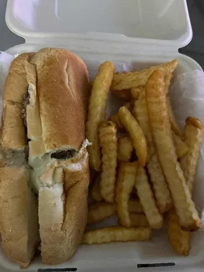 Philly Beef Sandwich with Fries, served with peppers, onions, and mayo