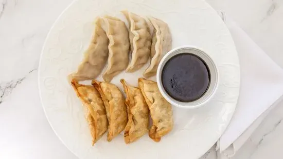 A7. Steamed or Fried Dumplings (8)