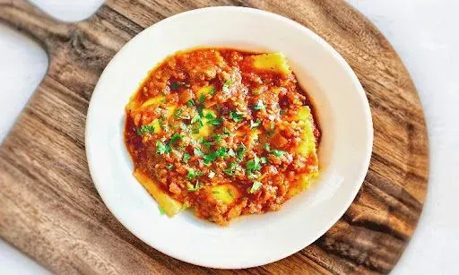 CHEESE RAVIOLI WITH MEAT SAUCE