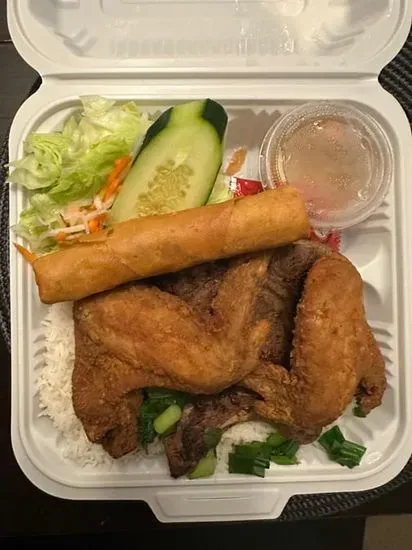 54. Grilled Pork Chop, Fried Chicken Wings & Egg Rolls Over Rice