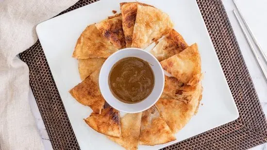 Dipping Roti With Curry