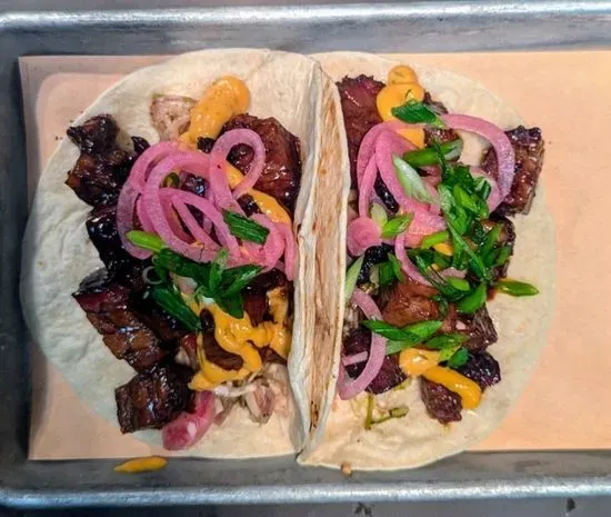 JERK BRISKET TACOS