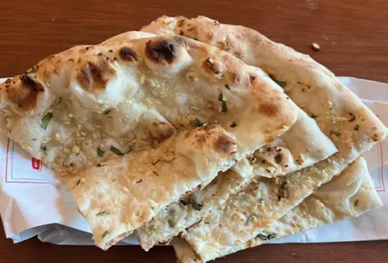 C64. Garlic Naan