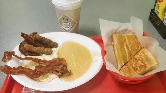 Grits Breakfast: Eggs,meat, Hash brown, toast 