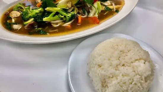 30c. Stir fry Tofu and mix veggies w/ steam rice