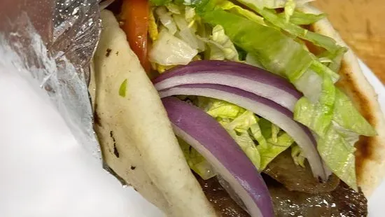 Gyro (Seasoned Lamb, Lettuce, Tomato, Onion, Tzatziki Sauce)