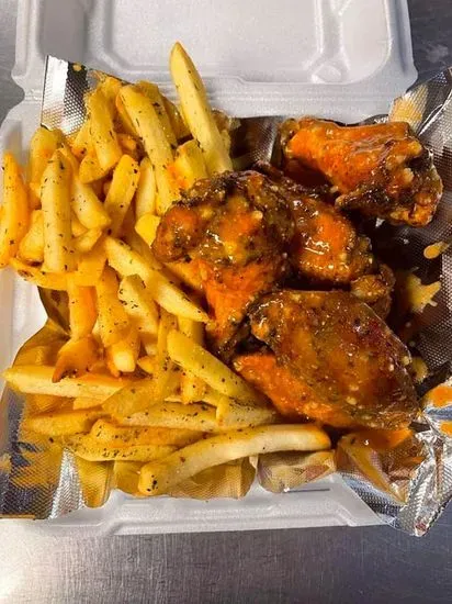 fried chicken wings and French fries