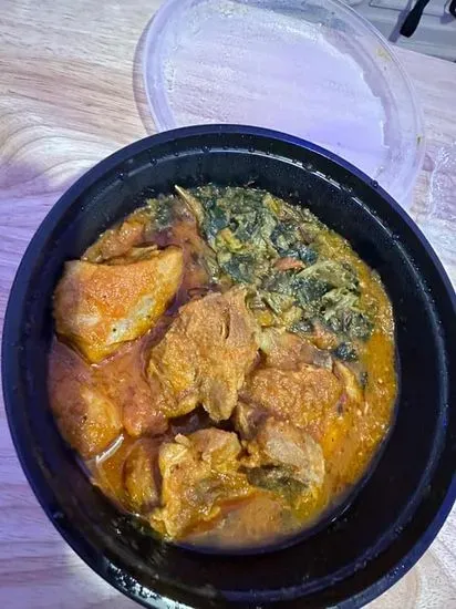 Eforiro chicken and pounded yam