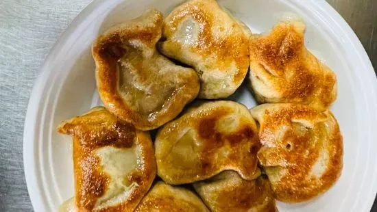 9. Steamed or Fried Dumplings (8)