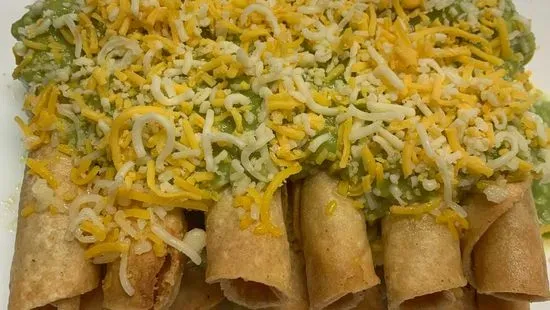 3 Rolled Tacos w/ Guacamole and Cheese