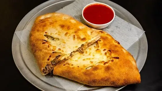 Sausage, Peppers & Onion - Calzones