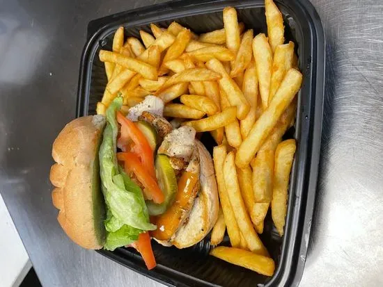 Grilled Chicken Deluxe Sandwich with fries.