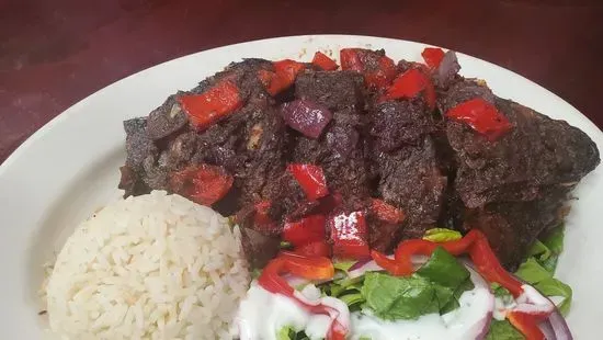 African grilled fish with rice and salad