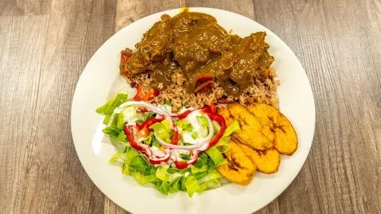 Curry Goat served with rice and peas