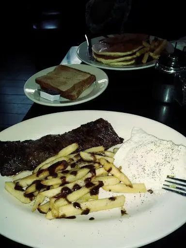 Steak And Two Eggs