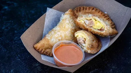 bacon, egg, and cheese empanada