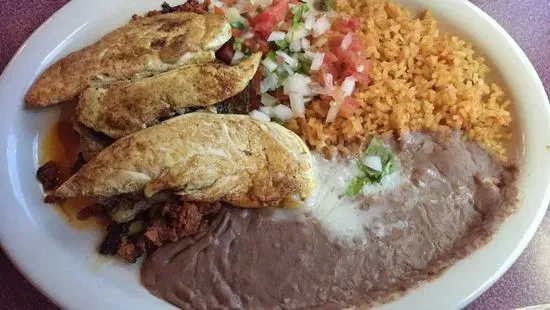 6. One Enchilada, One Taco, Rice and Beans