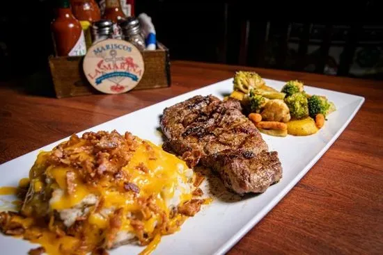 Rib-eye steak w / Mashed potatoes and veggies