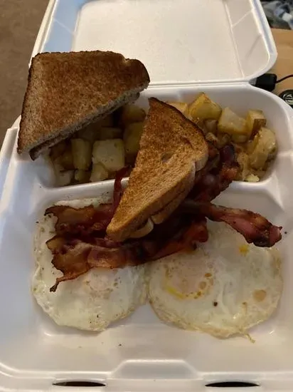 Two Eggs Any Style with Home Fries And Toast