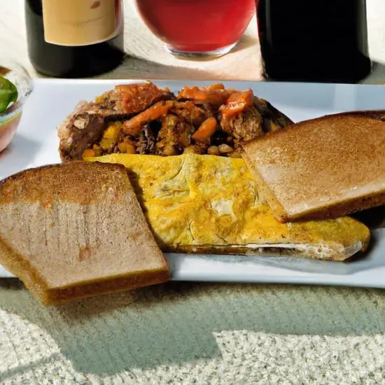 Steak & Cheese omelet with home fries and toast