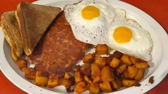 Eggs and homemade corned beef hash home fries