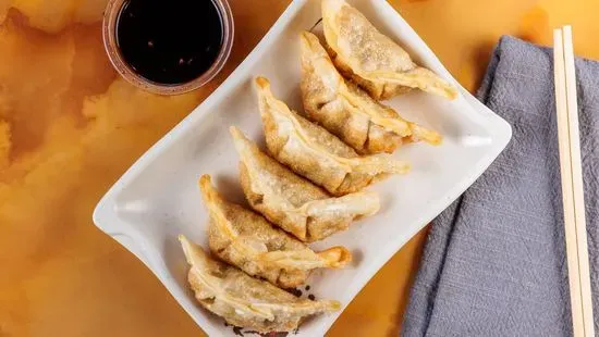 8. Steamed or Fried Pork Dumplings (6)