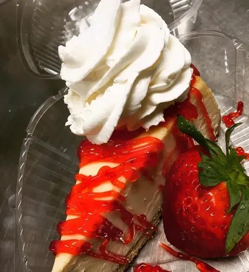 Strawberry cheesecake with fresh strawberries and strawberry glaze 