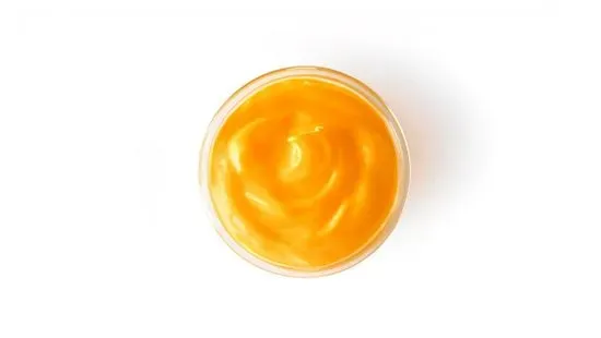 Cup of Cheddar Sauce