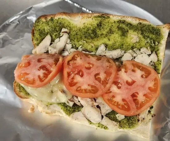 Chicken Pesto Sub - Handcrafted Bread, Pesto Sauce, Diced Chicken Breast, Tomatoes, Provolone Cheese