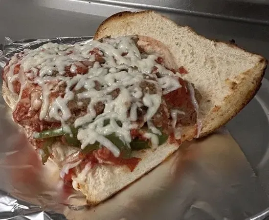 Meatball Sub - Handcrafted Bread, Italian Meatballs, Onions, Green Peppers, Mushrooms, Handcrafted Marinara Sauce, Mozzarella Cheese