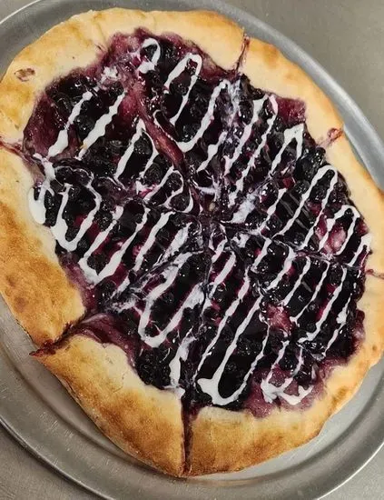 Blueberry Dessert Pizza - Handcrafted Dough with Blueberry Pie Filling and drizzled with Frosting