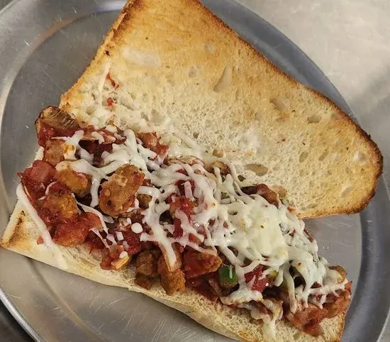 Italian Sausage Sub - Handcrafted Bread, Italian Sausage, Onions, Green Peppers, Mushrooms, Handcrafted Marinara Sauce, Mozzarella Cheese