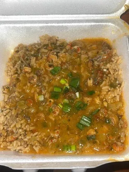 Crawfish Étouffée Over Rice Dressing