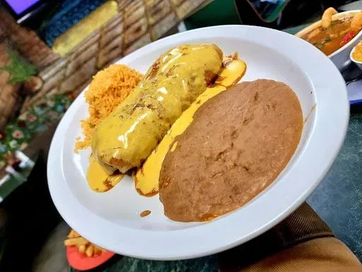 One Enchilada & One Tamal W/Gravy & Cheese