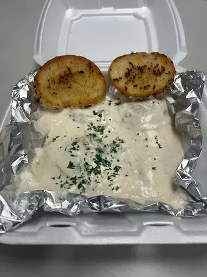 Mushroom Ravioli          (Served w/ side salad & garlic bread)