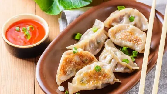 A7. Pork Dumplings (8 Pc)