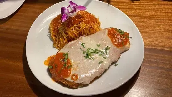 Chicken Parmesan over pasta