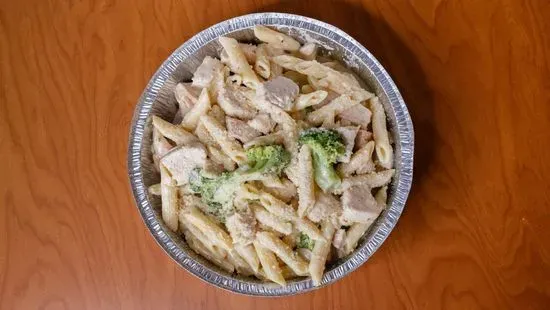 Ziti with broccoli and chicken in alfredo sauce