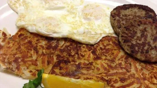 Scrapple and eggs with home fries and toast