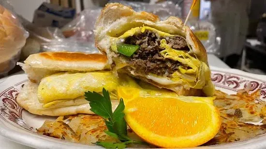 Cheesesteak, Egg & Cheese on a long roll