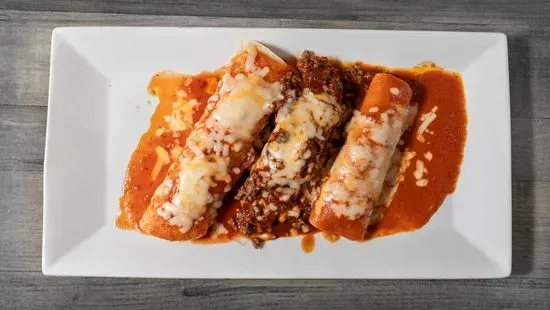 12. Two Chiles Rellenos Stuffed with Cheese, Beef, Rice and Beans