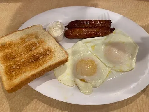 Meat With 2 Eggs On Choice Of Toast Sandwich