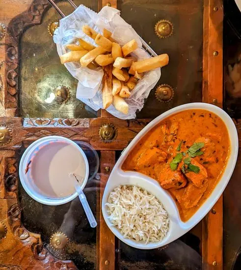 Rice bowl with chicken tikka masala