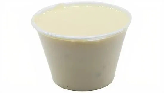 Side of Our Famous White Cheddar Queso