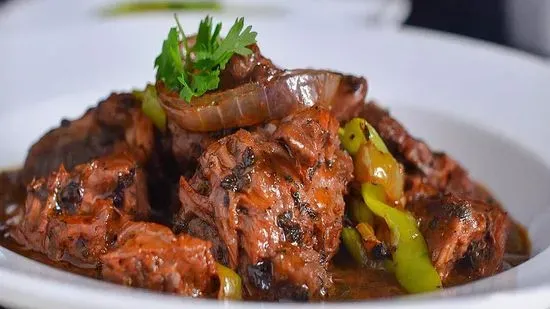 Chivo guisado ( stew goat )