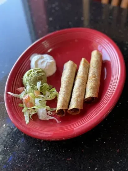 Three Rolled Taquitos with Guacamole and Sour Cream