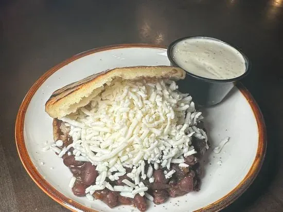 AREPA DOMINO (BLACK BEANS & WHITE CHEESE)