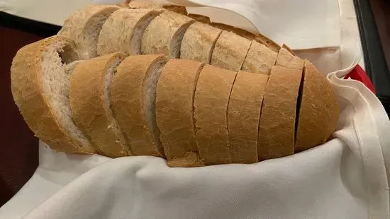 One Loaf of French Bread Sliced with Butter