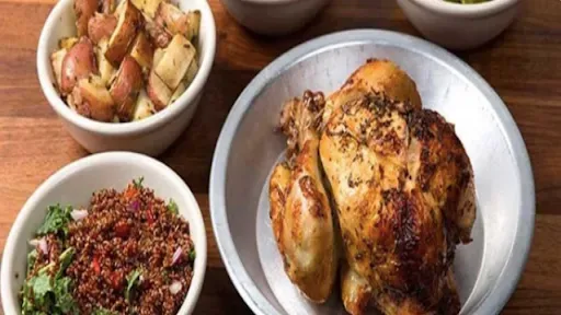 Whole Chicken + 4 Sides + 4 Sauces