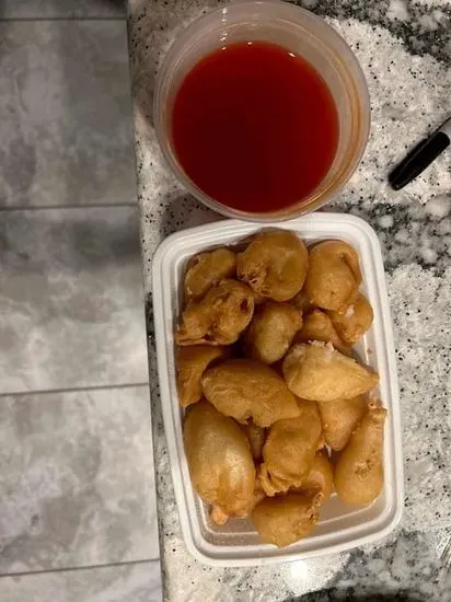 24. Sweet & Sour Chicken or Pork